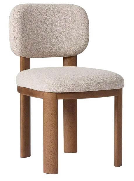 A contemporary dining chair featuring a rounded, padded backrest and seat, both upholstered in a textured boucle fabric. The frame and legs are constructed from solid wood with a warm, medium brown finish, and the legs are distinctively cylindrical. — 3D model
