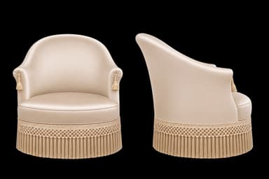 A compact, rounded armchair upholstered in a smooth, light beige fabric, featuring small integrated armrests with decorative tassels and a deep fringed skirt covering the base. — 3D model