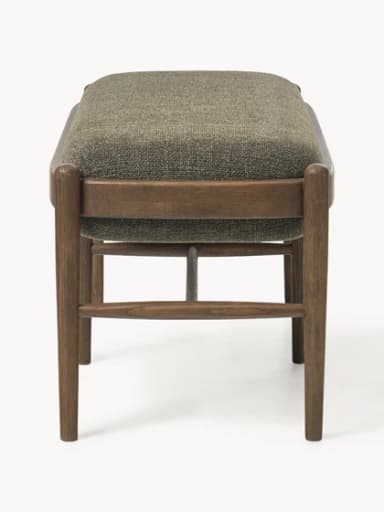 A rectangular upholstered ottoman featuring a solid wooden frame with rounded edges and four tapered legs. The top is generously padded and covered in a textured, greenish-brown fabric, while horizontal wooden stretchers provide structural support. — 3D model