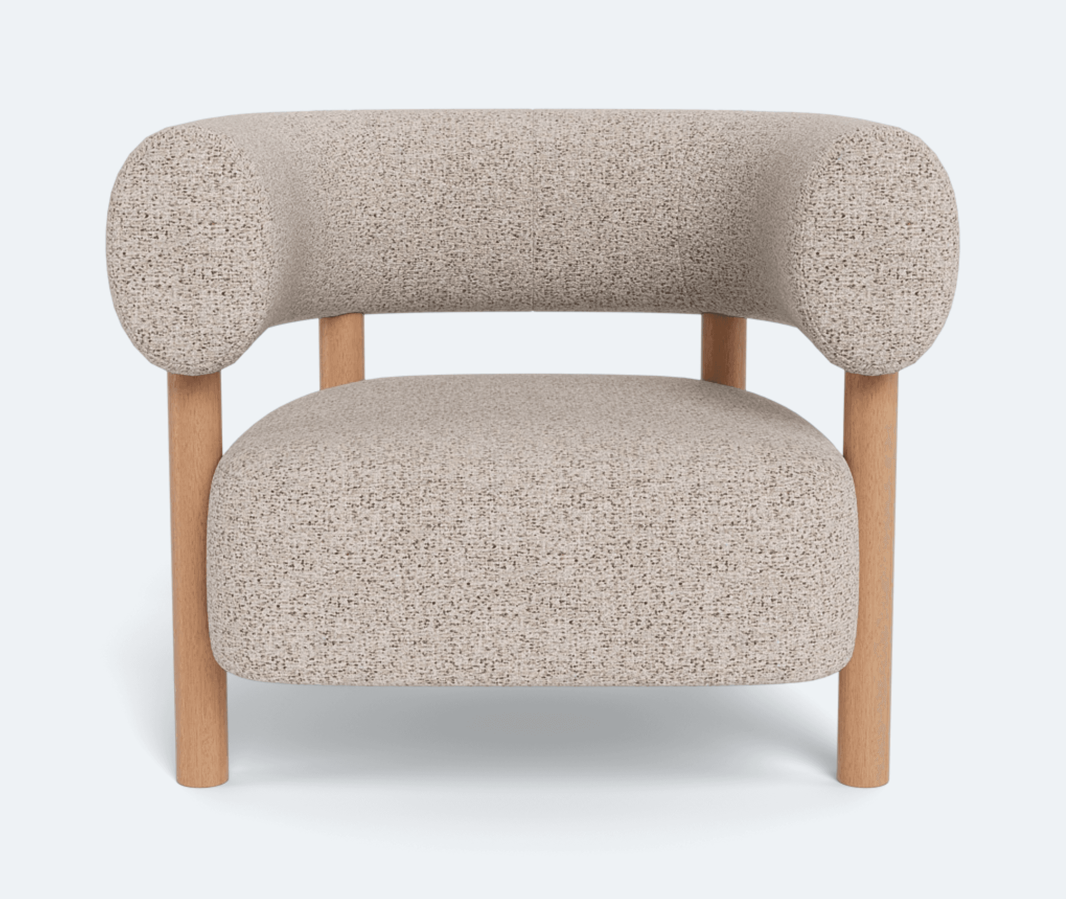 A single accent chair featuring a rounded, enveloping backrest and seat upholstered in a textured, light-colored boucle or similar fabric. The chair is supported by a minimalist frame constructed from light-toned wood, with four cylindrical legs extending from the base and two upright supports that integrate into the armrests and connect to the backrest. The design blends soft, organic curves with a clean, natural material aesthetic. — 3D model