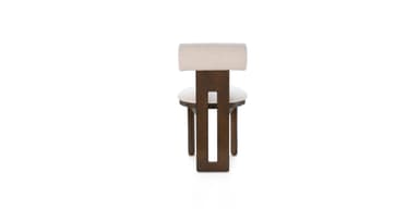 A wooden chair with an upholstered seat and backrest. The chair features a solid wood frame with a rectangular central support that has two cut-out rectangular openings. The seat is round and upholstered in a light-colored fabric. The backrest is also upholstered and has a horizontal, elongated rectangular shape. — 3D model
