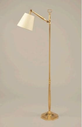 An adjustable floor lamp made of polished brass with a cream-colored fabric shade. The lamp features an octagonal base, a slender column with a height adjustment mechanism, and an articulated arm supporting the shade. The shade is a classic tapered drum shape, and the overall finish is a gleaming brass. — 3D model
