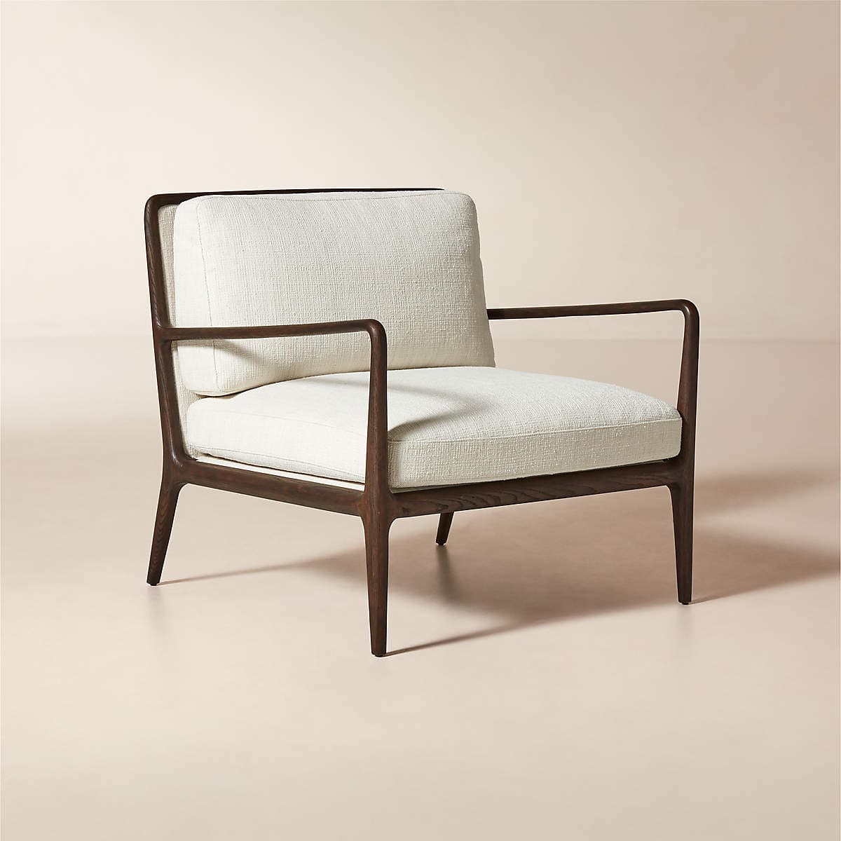 A contemporary lounge chair featuring a dark stained solid wood open frame and thick, removable upholstered cushions in an off-white textured fabric. — 3D model