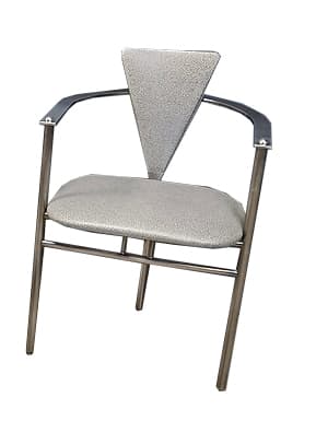 A modern armchair with a tubular metal frame and upholstered seat and backrest. The frame is constructed from polished chrome or stainless steel, featuring cylindrical legs and armrests. The seat and backrest are upholstered in a light-colored fabric with a speckled pattern. The design is minimalist and functional. — 3D model
