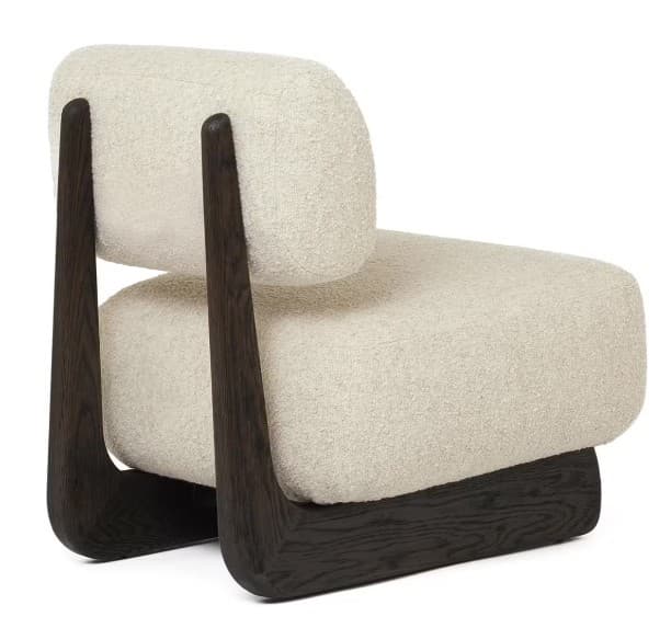 A modern, low-profile lounge chair featuring plush, off-white bouclé upholstery and a distinctive dark-stained wooden frame. The chair consists of a thick, cushioned seat and a separate, curved backrest, both generously upholstered. The solid wooden frame acts as both the base and the support for the backrest, showcasing smooth, rounded lines and a visible wood grain. — 3D model
