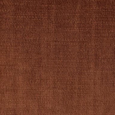 A contemporary lounge chair featuring a distinctive barrel-shaped silhouette, upholstered in a rich, reddish-brown velvet fabric. The chair is characterized by its deep, plush seating and integrated, low-profile armrests and backrest, which form a continuous, enveloping curve, suggesting substantial comfort and a modern aesthetic. It lacks visible legs, appearing to rest directly on a recessed base. — 3D model