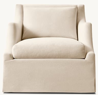 An upholstered armchair featuring a clean, contemporary design with a full skirted base. The chair is covered in a light beige, subtly textured fabric and includes broad, rolled arms and separate, plush seat and back cushions, suggesting comfort and a refined aesthetic. — 3D model