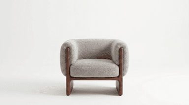 A contemporary armchair featuring a rounded, plush silhouette with light gray textured upholstery and an exposed solid dark wood frame forming the base and armrest accents. The chair has a minimalist yet inviting design. — 3D model