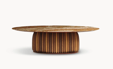 An oval coffee table featuring a multi-toned marble top and a distinctive cylindrical base constructed from numerous vertical, rounded wooden slats in varying natural wood hues, resting on a subtle reddish-brown plinth. — 3D model