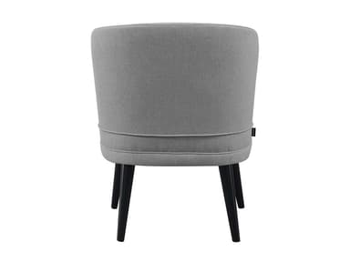 A compact, armless chair with a rounded back and light grey fabric upholstery, supported by four splayed black wooden legs, suitable for contemporary interiors. — 3D model