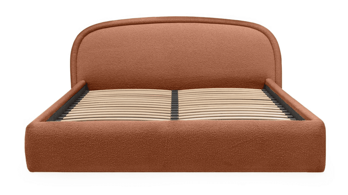 A contemporary bed frame featuring a fully upholstered body and a softly curved headboard, finished in a textured boucle fabric. It incorporates an integrated wooden slat foundation. — 3D model