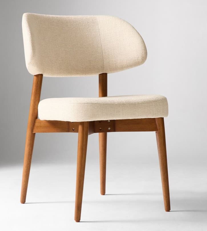 An armless chair featuring a curved, upholstered backrest and a padded seat, supported by four tapered wooden legs. — 3D model