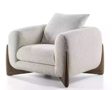 A contemporary single-seater lounge armchair featuring a plush, rounded silhouette upholstered in a light, textured bouclé fabric. The chair is supported by a distinctive, sculptural dark-stained wooden base that wraps around the lower portion of the chair's sides and back, providing stability and a striking visual contrast. It includes a loose back cushion, also upholstered in the same bouclé fabric. — 3D model