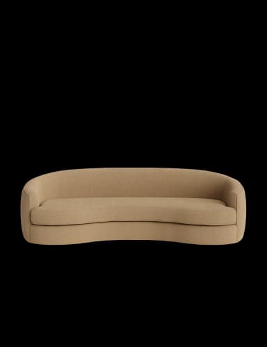 A contemporary curved sofa with a rounded silhouette. It features a single, continuous seat and backrest, upholstered in a textured beige fabric. The base appears to be dark and low-profile, creating a floating effect. — 3D model