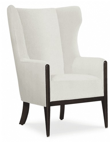 A modern wingback armchair featuring an exposed dark wood frame and light-colored fabric upholstery. The chair has a tall, structured back with subtle wings that extend forward, providing a sense of enclosure. The arms are gently curved, with the wood frame extending upwards to form the armrests before transitioning into the upholstered back. Tapered cylindrical legs support the chair, and the overall design combines traditional wingback elements with a contemporary aesthetic. — 3D model