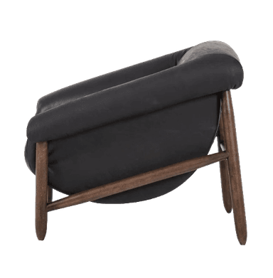 A contemporary lounge chair with a low-slung, curved profile, featuring a generously padded seat and back upholstered in black material, likely leather or faux leather. The upholstery is cradled within a sturdy, splayed dark wood frame, giving it a modern yet inviting appearance. The design emphasizes comfort and a relaxed posture. — 3D model