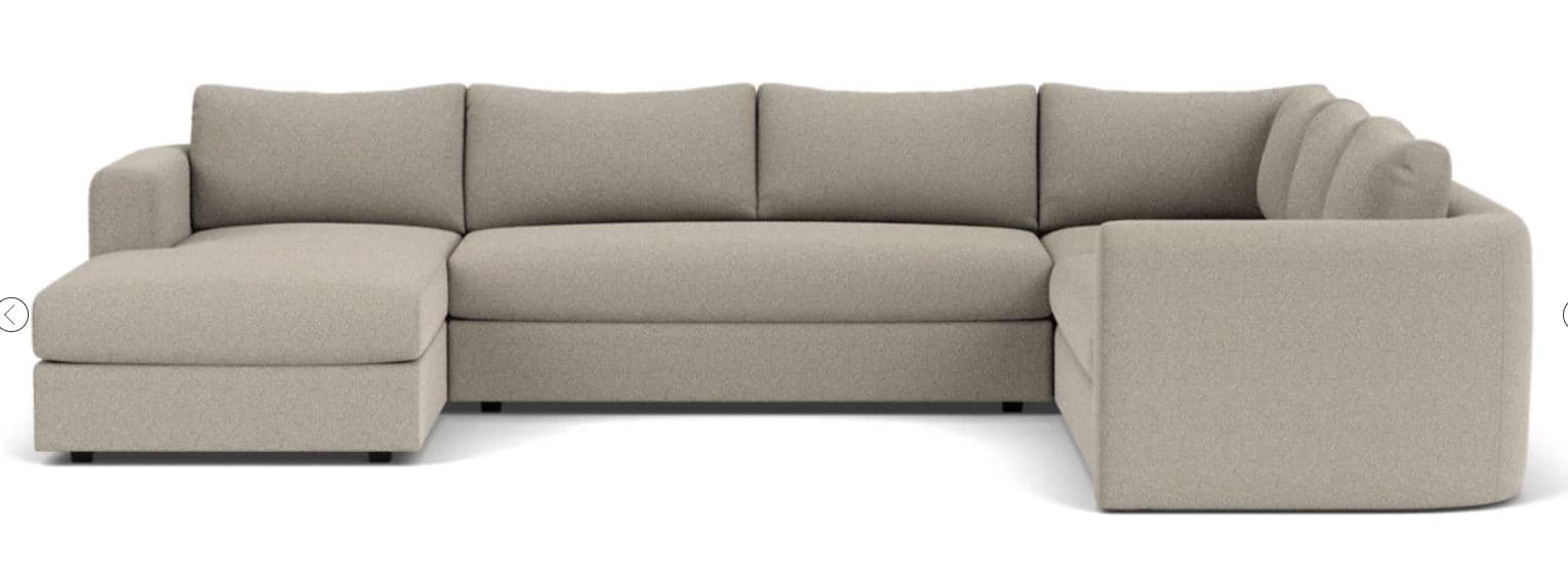 A large, contemporary U-shaped sectional sofa upholstered in a light beige or greige textured fabric. It features a left-arm facing chaise lounge, a central armless section, and a right-side armless return, forming a spacious, modular seating arrangement. The design includes clean lines, low-profile track arms, and loose back cushions, indicative of modern residential furniture. — 3D model
