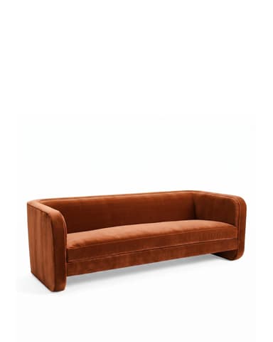 A contemporary three-seater sofa with a sleek, minimalist design. It features a low-profile frame with integrated arms that extend to the front, creating a cohesive look. The upholstery appears to be a soft, plush fabric with a matte finish, and the seat and back cushions are well-defined. The sofa sits on block-style legs integrated into the frame. — 3D model