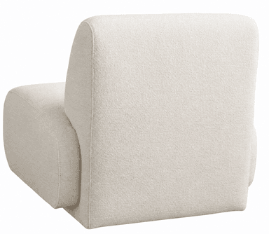 An armless contemporary lounge chair upholstered in a textured, off-white bouclé fabric. The design features soft, rounded edges and a low backrest, resting on a subtle plinth base. Its modular form suggests it can be used individually or as part of a larger seating arrangement. — 3D model