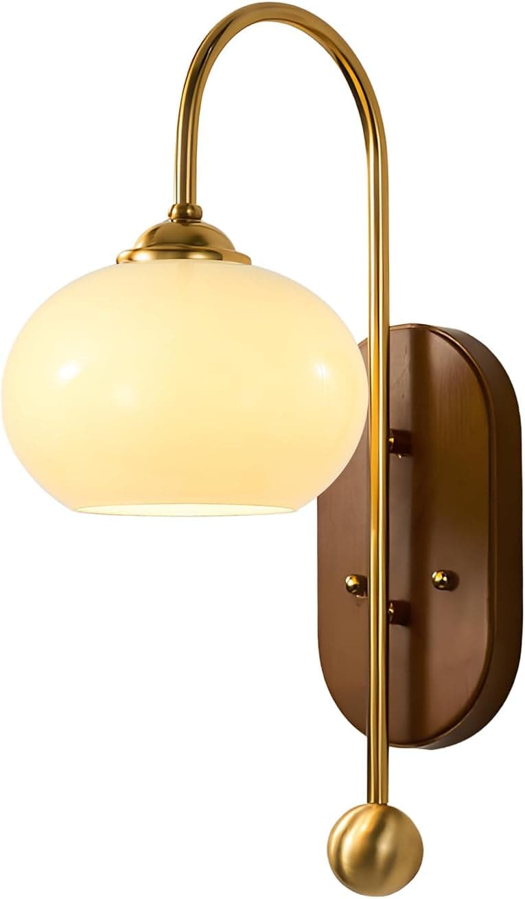 A wall-mounted lighting fixture featuring a curved brass arm extending from an oval wooden backplate. The arm supports a spherical opal glass shade that emits a warm, diffused light. A decorative brass finial adorns the bottom end of the brass arm, completing the elegant design. — 3D model