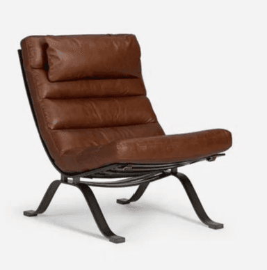 A low-slung lounge chair featuring a dark, possibly black or dark bronze, metal frame and thick, horizontally ribbed brown leather cushions. The cushions provide seating for the back, seat, and an integrated headrest. The metal frame is elegantly curved, forming the support structure for the comfortable seating elements, and appears to rest on flat, rectangular feet. — 3D model
