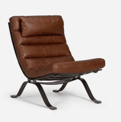 A low-slung lounge chair featuring a dark, possibly black or dark bronze, metal frame and thick, horizontally ribbed brown leather cushions. The cushions provide seating for the back, seat, and an integrated headrest. The metal frame is elegantly curved, forming the support structure for the comfortable seating elements, and appears to rest on flat, rectangular feet. — 3D model
