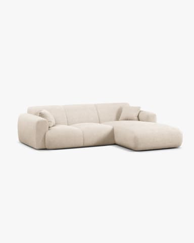 A contemporary L-shaped sectional sofa featuring a left-hand chaise lounge, upholstered in a light beige bouclé fabric. The sofa has a low-profile design with generously padded cushions and rounded arms, emphasizing comfort and modern aesthetics. Dimensions are provided on the image. — 3D model