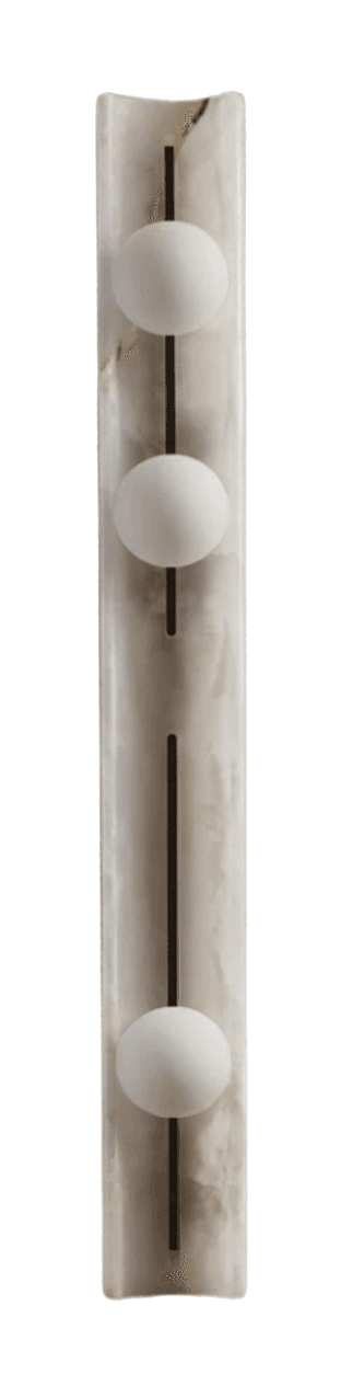 A modern wall-mounted lighting fixture featuring a tall, rectangular panel of translucent, veined white onyx. Three evenly spaced spherical white light diffusers protrude from the central front surface of the onyx slab. A dark, likely metallic, mounting plate is visible from the side, providing a subtle contrast to the luminous stone. — 3D model