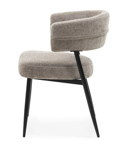 An upholstered dining armchair featuring a contemporary design. It has a rounded, curved backrest that seamlessly transitions into integrated armrests. The entire seat and back are covered in a light beige or greige textured fabric. The chair is supported by four slender, tapered black metal legs, giving it a modern and minimalist appearance. The proportions suggest suitability for dining or as an accent piece. — 3D model