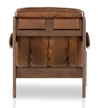 A tufted armchair featuring a wooden frame and brown leather upholstery. The frame has a distinct organic shape with curved elements. The seat and back cushions are deeply tufted with prominent buttons, and the armrests are padded and covered in leather. The overall design suggests a mid-century modern or contemporary style. — 3D model