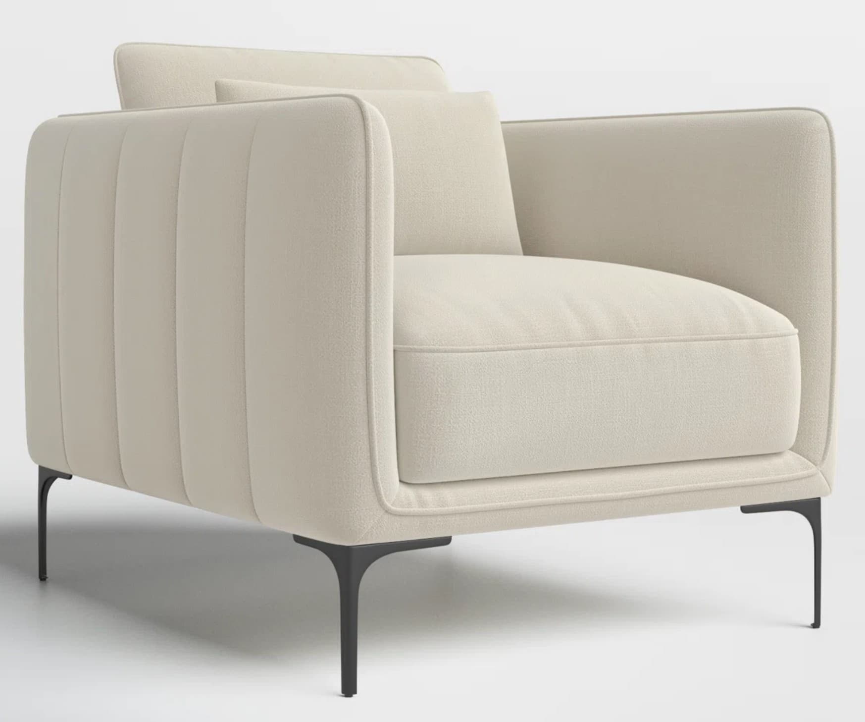 A modern upholstered armchair featuring channel tufting on the outer back and arms, light-colored fabric, and sleek black metal legs. — 3D model
