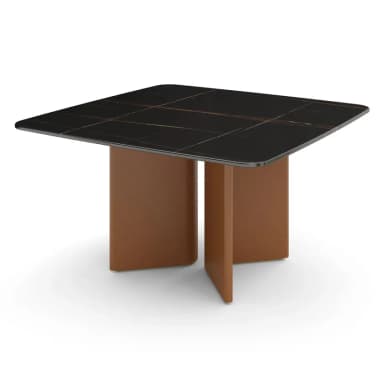 A contemporary square-shaped dining table featuring a black marble top with distinctive gold-copper veining, supported by a sculptural, rectangular pedestal base in a matte tan finish. The tabletop has subtly rounded corners, enhancing its modern aesthetic. — 3D model