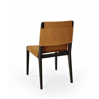 A modern dining chair with a wooden frame and upholstered seat and backrest. The frame consists of four dark stained wooden legs and a visible wooden structure supporting the seat and backrest. The seat and backrest are upholstered with a tan-colored, textured material that appears to be suede or a similar soft leather. The upholstery is designed as a continuous band wrapped around the frame, with visible stitching lines. The chair has a minimalist design with clean lines and a contemporary aesthetic. — 3D model
