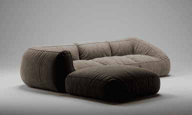 A modular sectional sofa with an accompanying ottoman. The sofa features a low profile, plush cushioning, and a fabric upholstery. The design is characterized by rounded forms and segmented seating areas achieved through stitching. — 3D model