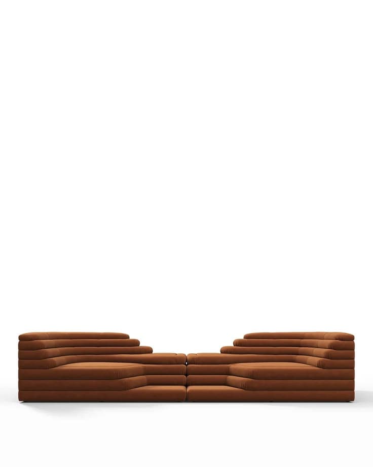 A modular sofa with a stepped, layered design. The sofa is upholstered in a textured fabric and features a unique, undulating silhouette that creates multiple seating levels and sections. It appears to be composed of several interlocking modules, allowing for flexible arrangement. — 3D model