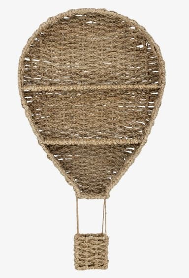 A decorative wall-mounted shelf designed in the shape of a hot air balloon, crafted from woven natural fibers. It features a large balloon-shaped upper section with two internal shelves and a smaller, rectangular basket-like base suspended below, mimicking the gondola of a hot air balloon. — 3D model
