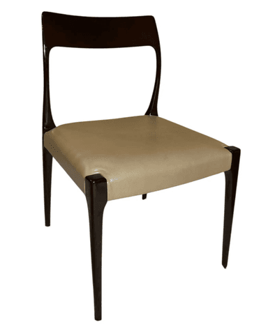 A minimalist chair featuring a dark, possibly rosewood or mahogany, curved frame and slender, tapered legs. The seat and a small upper backrest pad are upholstered in a light, cream-colored material, likely leather or faux leather. The chair has an elegant, streamlined profile, characteristic of mid-century design, designed for dining or as an accent piece. — 3D model