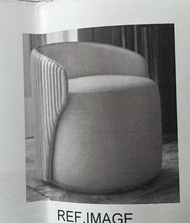 A modern, barrel-shaped accent chair upholstered in a light gray fabric. The chair features a distinctive fluted or ribbed exterior on its rounded backrest, which seamlessly transitions into integrated armrests. The seat cushion is well-padded and the chair sits on a low, fully upholstered base, giving it a monolithic and sculptural appearance. Its rounded silhouette contributes to a soft, inviting aesthetic. — 3D model
