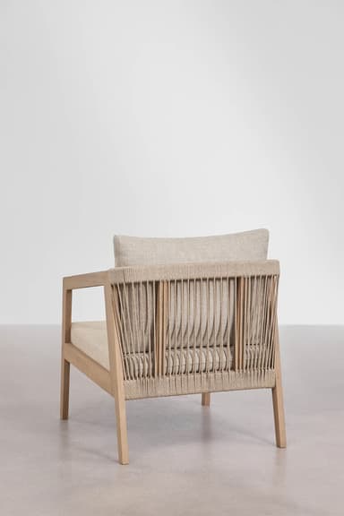 A modern armchair with a light wood frame and a woven rope backrest. It features a cushioned seat and back, upholstered in a neutral-toned fabric. The design emphasizes natural materials and a minimalist aesthetic, suitable for outdoor or indoor use. — 3D model