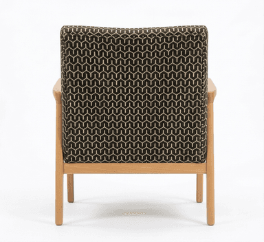 An armchair featuring a light wood frame with exposed armrests and legs, and a backrest upholstered in a black and tan geometric patterned fabric. The image shows the chair from the rear. — 3D model