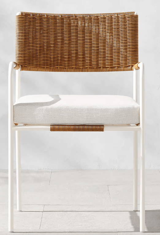 A contemporary armchair featuring a white metal frame, a natural-toned woven rope backrest, and an upholstered white seat cushion. The armrests are partially wrapped with the same natural-toned rope. The design is clean, minimalist, and suitable for both indoor and outdoor settings. — 3D model