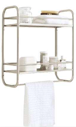 A two-tiered wall shelf with a towel bar, constructed from metal with a brushed finish. The top shelf holds cotton swabs in a glass jar and a folded towel with a brush. The lower shelf contains various cosmetic containers and bottles. A white waffle-weave towel is suspended from the towel bar below the shelves. — 3D model