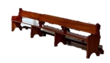 A long, traditional wooden bench with a high backrest and an integrated lower shelf, finished in a medium brown tone. The bench features multiple vertical support legs with decorative arched cut-outs at the base, providing stability and a classic aesthetic. Its simple yet robust construction suggests suitability for communal seating environments. — 3D model