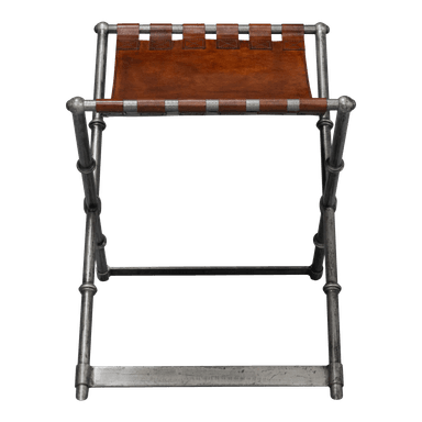 A folding stool featuring an X-shaped metal frame and a sling seat crafted from brown leather. The metal frame displays an aged, silver-toned finish with subtle decorative turnings. The leather seat is secured to the frame with leather straps and visible cross-stitching. — 3D model