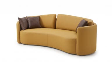 A modern, gracefully curved sofa upholstered in a mustard yellow fabric, featuring integrated armrests and a low-profile design. It is accessorized with two dark brown throw pillows, providing a contrasting accent. — 3D model