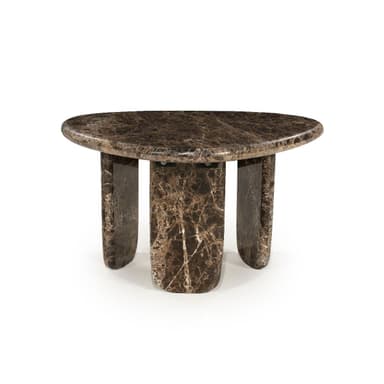 A low-profile coffee table constructed entirely from dark, veined marble. The tabletop features an organic, somewhat kidney or pebble-like shape with softly rounded edges. It is supported by three thick, sculptural slab legs, each with rounded bases and edges, contributing to a substantial and monolithic appearance. The marble displays rich brown and black tones with prominent lighter veining throughout. — 3D model