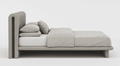 A modern upholstered bed frame with a low profile and a curved headboard. The bed is complete with bedding, including sheets, pillows, and a decorative throw pillow. The frame appears to be fabric-covered, featuring a continuous curve from the footboard to the headboard, which has rounded edges. A subtle handle or recess is visible on the side of the frame. — 3D model