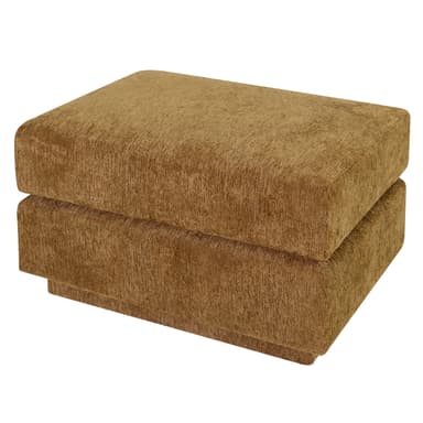 A rectangular upholstered ottoman featuring a textured golden-tan fabric. The design is a solid, block-like form with a slightly recessed base, giving it a sturdy, legless appearance. The upholstery has a subtle vertical pile texture across all visible surfaces. — 3D model