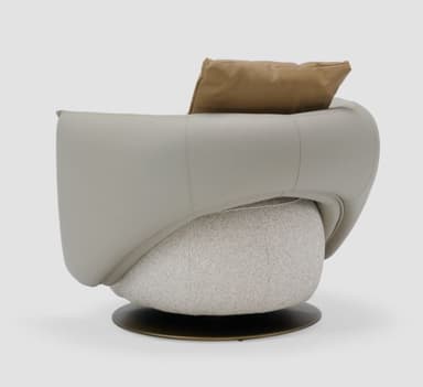 A modern, rounded swivel lounge chair featuring a distinctive two-tone upholstery and a dark metallic base. The exterior shell is smooth, light gray, while the interior cushioning is upholstered in a textured, off-white fabric. A separate tan lumbar pillow rests against the backrest. — 3D model