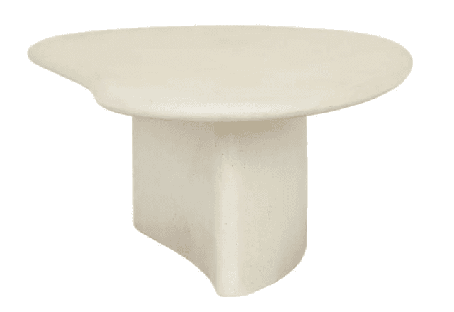 An off-white, sculptural coffee table featuring an organic, irregular-shaped tabletop supported by a matching monolithic pedestal base. The material appears to be a smooth, matte concrete composite, giving it a minimalist and contemporary aesthetic. — 3D model